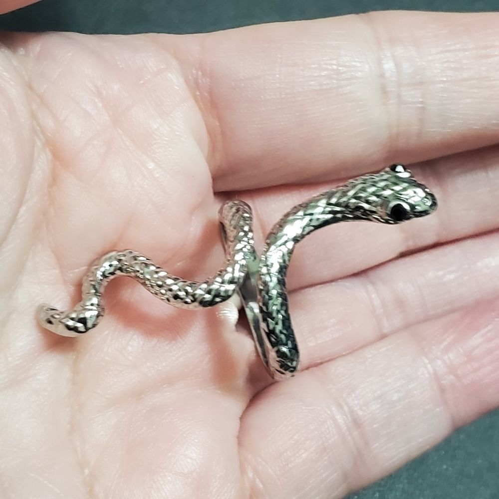 Silver tone open snake ring currently a 6 black